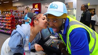 Customer Kisses Cashier on the Clock!