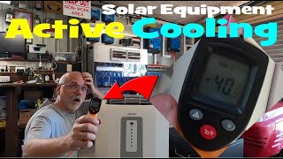 Actively cooling solar and battery equipment with an air conditioner. Beneficial or waste?