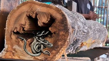 The gruesome process of sawing teak logs from the cemetery at the sawmill 