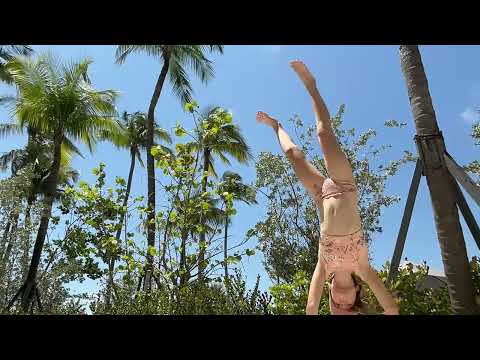 Doing some gymnastics at my beach/pool