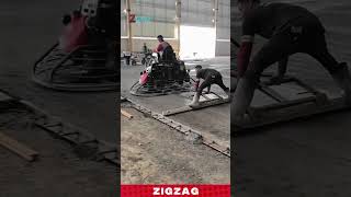 Ride-On Power Trowel for Efficient Concrete Leveling and Finishing in Warehouse Construction