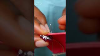 Sew claw stones onto fabric in simple steps