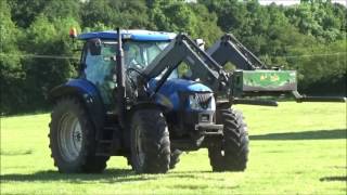 Silage 2017 - Loading & Stacking Silage Bales with New Holland T6030 & Merlo