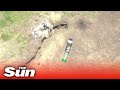 Ukraine drone drops grenade in Russian soldiers trench