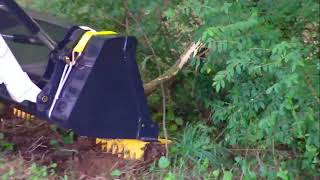 Ratchet Rake on Compact Tractor loader bucket - Brush Removal