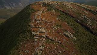 Aerial drone footage along the crest of a mountain in the Adirondacks
