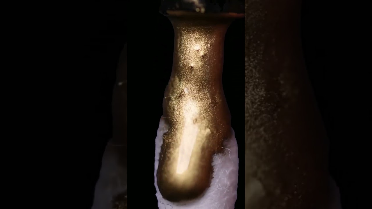 Golden Marker on Cotton Bud in Macro  