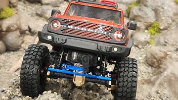 SCX24 VENTING BEAD LOCK TIRES, WHEEL SPACERS, STEERING LINKAGE AND BRASS STEERING KNUCKLES.
