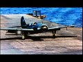 TBF Avengers, F6F Hellcats, A-25, SB2C and SBF Helldivers land on the deck of 'Th...HD Stock Footage