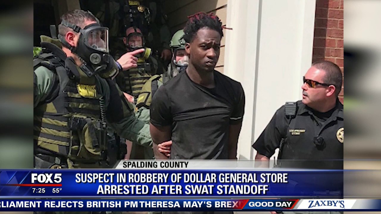 Robbery suspect arrested after SWAT standoff - YouTube