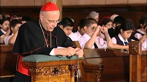 CARDINAL GEORGE PRAYS THE ROSARY