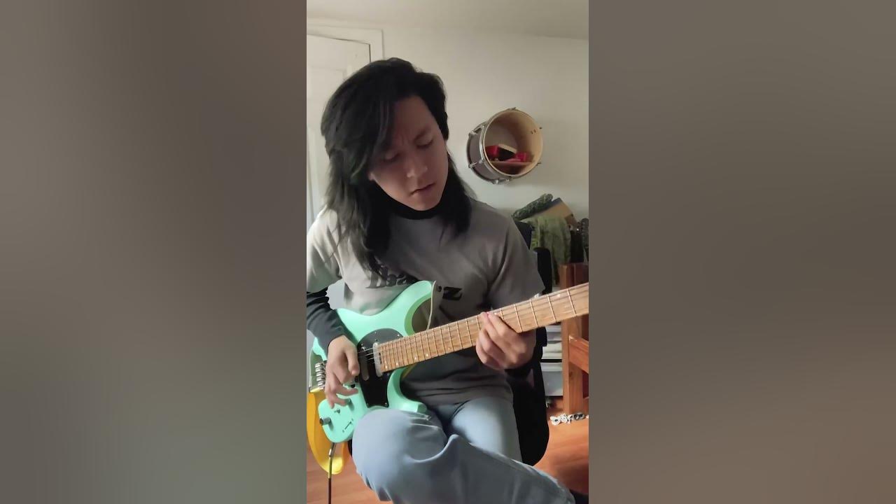 playing the guitar part i wrote for Reverie by Polyphia
