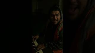 Luis singing Spanish song on piano while we served our time in sheriff program in Santa Clara