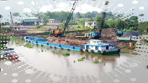 Sang cap. Xáng dây trên bãi cát. xà lan chở cát 710 - maycatluaKupota