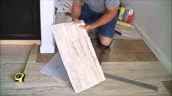 TrafficMaster ceramica 12" X 24" vinyl tile floor installation. 