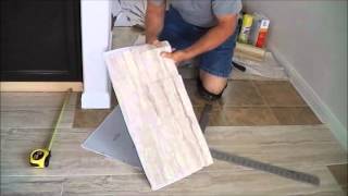 This is a super fast, easy and inexpensive vinyl tile installation
that looks feels like real ceramic without all the work mess of ...