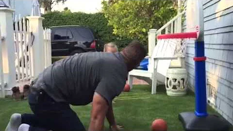 Dad swats 2YO on basketball court
