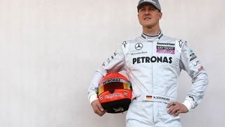 Michael Schumacher: doctors say 'slight improvement' in Formula One champion's condition