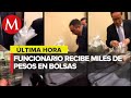 Difunden video de ex funcionarios del Senado recibiendo bolsas de dinero