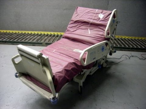 Hill Rom Mdl P1900 Total Care SP02RT Hospital Bed on GovLiquidation.com