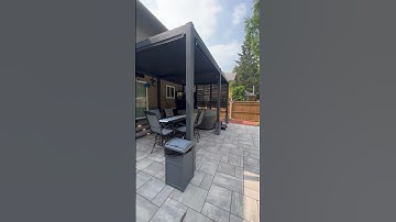 The Hanso Pergola. This aluminum pergola looks looks amazing on this patio! #backyarddesign #patio