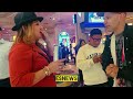 A Boxing Fan asks Elie Seckbach to sign her arm so she could get it tattooed