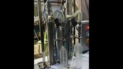 Semi Auto Twin Nozzle Liquid Filling Machine