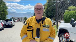 Fire inches from homes