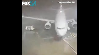 WATCH: Strong wind gusts on Tuesday push jet away from gate at Dallas Airport.