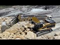Caterpillar 385C Excavator Loading Caterpillar 775 Dumper And Trucks - Pyramis Ate