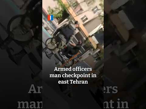 Armed officers man checkpoint in east Tehran