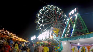Beautifully decorated ferris wheel in a park during dussehra