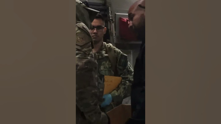 First flight of deported migrants arrive at Guantanamo Bay