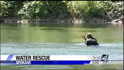 Ofc. Palmer saves drowning man KXLY 06 09 2014 17 02 25
