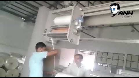 Fabric roll stretch wrapping/packing machine by AnH Limited