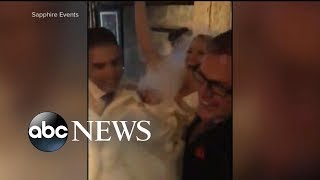 Couple get married in torrential rain