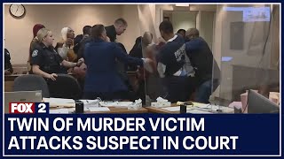 Twin of murder victim attacks suspect in court after seeing evidence video screenshot 3