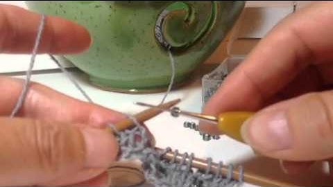 Adding beads to your knitting with crochet hook