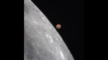 Mars passing behind the Moon!