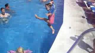 Sofia and Ali jumping in Pool