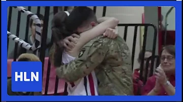 Military brother surprises sister at her last game!