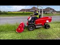 RINO Electric Power Unit Fitted With Flail Deck Making Long Grass Short