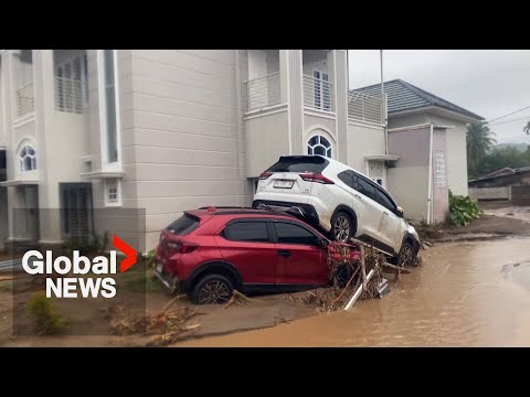 At least 60 dead after rare tropical cyclone hits Indonesia
