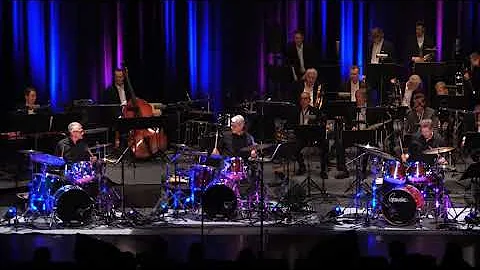 3x Grufstedt -Three drummers in front of a big ban...