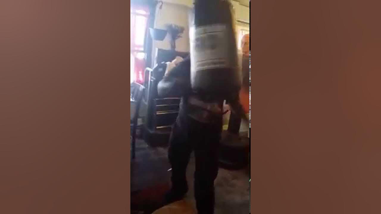 Elbows training on sand punching bag YouTube