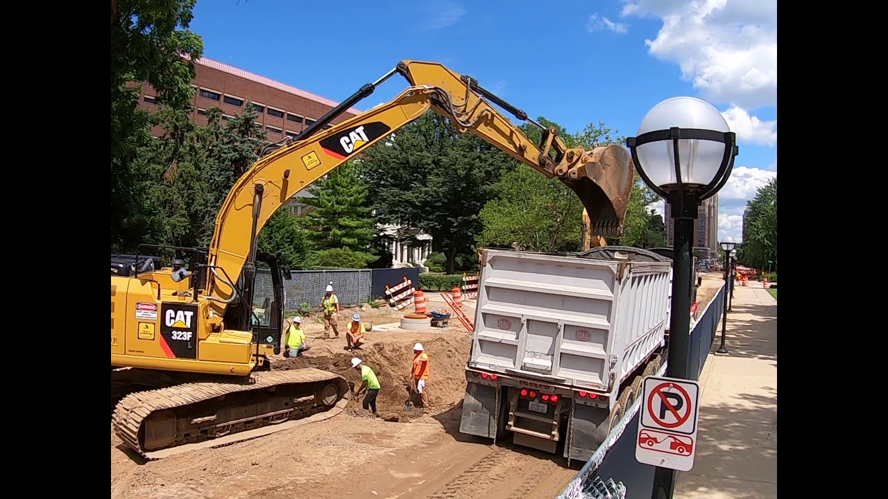 South University Road Work - Fix the Damn Roads Whitmer - University of Michigan - Caterpillar 323F