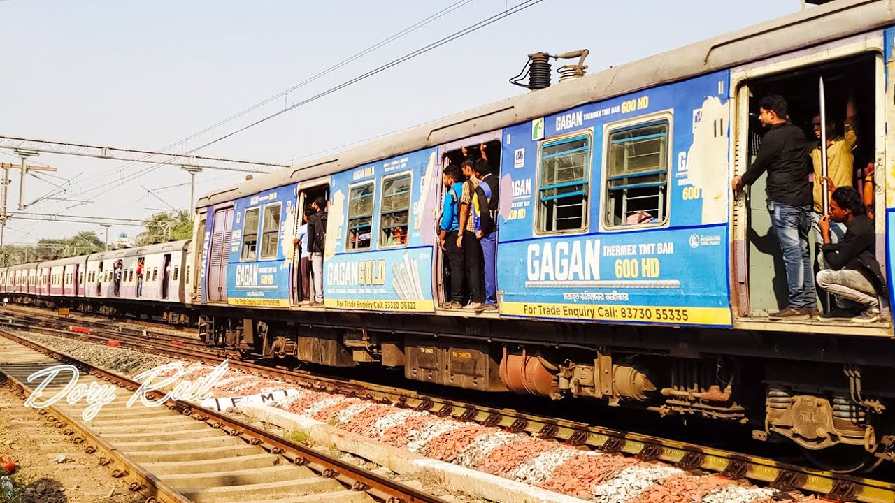 Beautiful EMU local Train crossing at afternoon