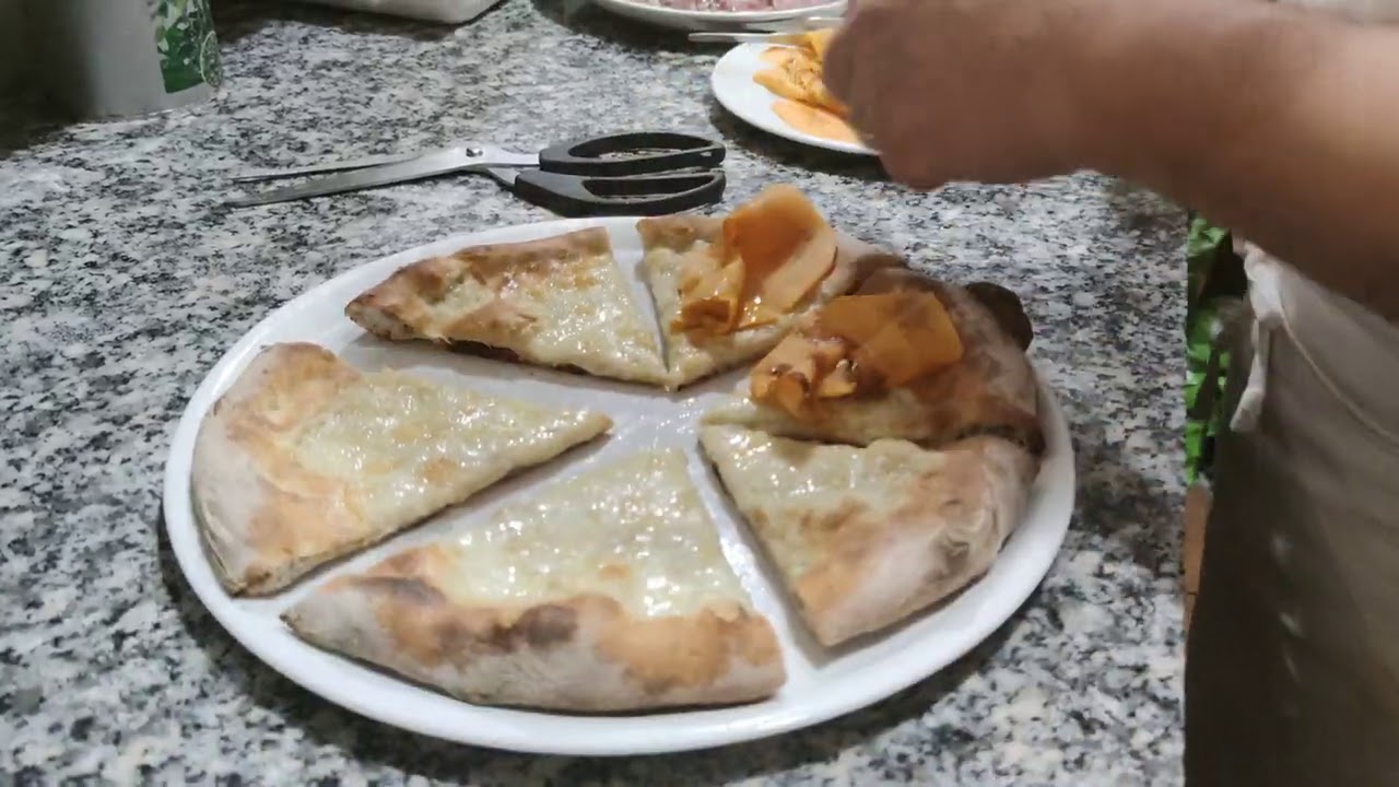 Pizza con Zucca alla Brace, Carpaccio di Manzo Affumicato, Provola Affumicata, Ricotta Salata e Pesto di Rucola