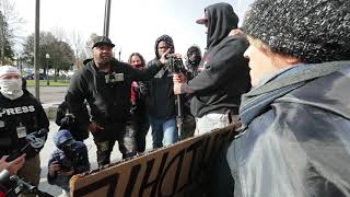 People confront supporter of Kyle Rittenhouse outside Kenosha courthouse