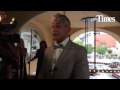 Olympic diving gold medalist Greg Louganis talks to the media before Respect the Water banquet.